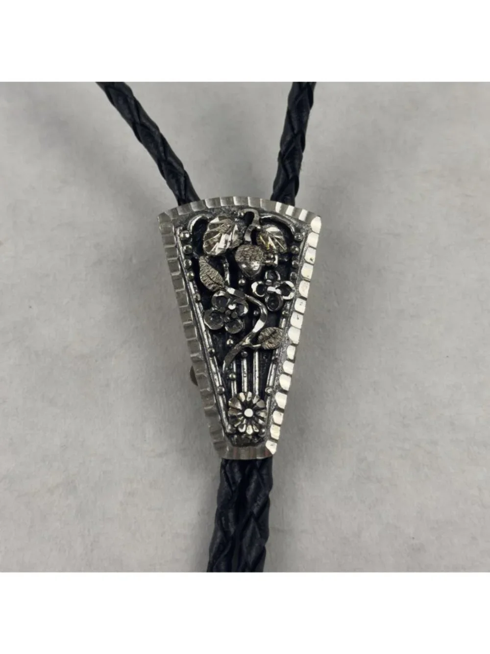 Vtg Black Hills Sterling Silver Bolo Tie Floral Silver Tips Braided Leather USA